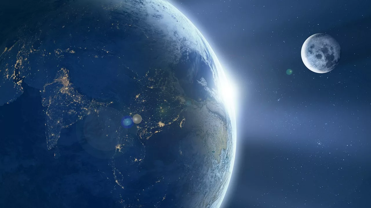 La Terre vue de l'orbite avec le Soleil levant et la Lune, illustration de Project Suncatcher